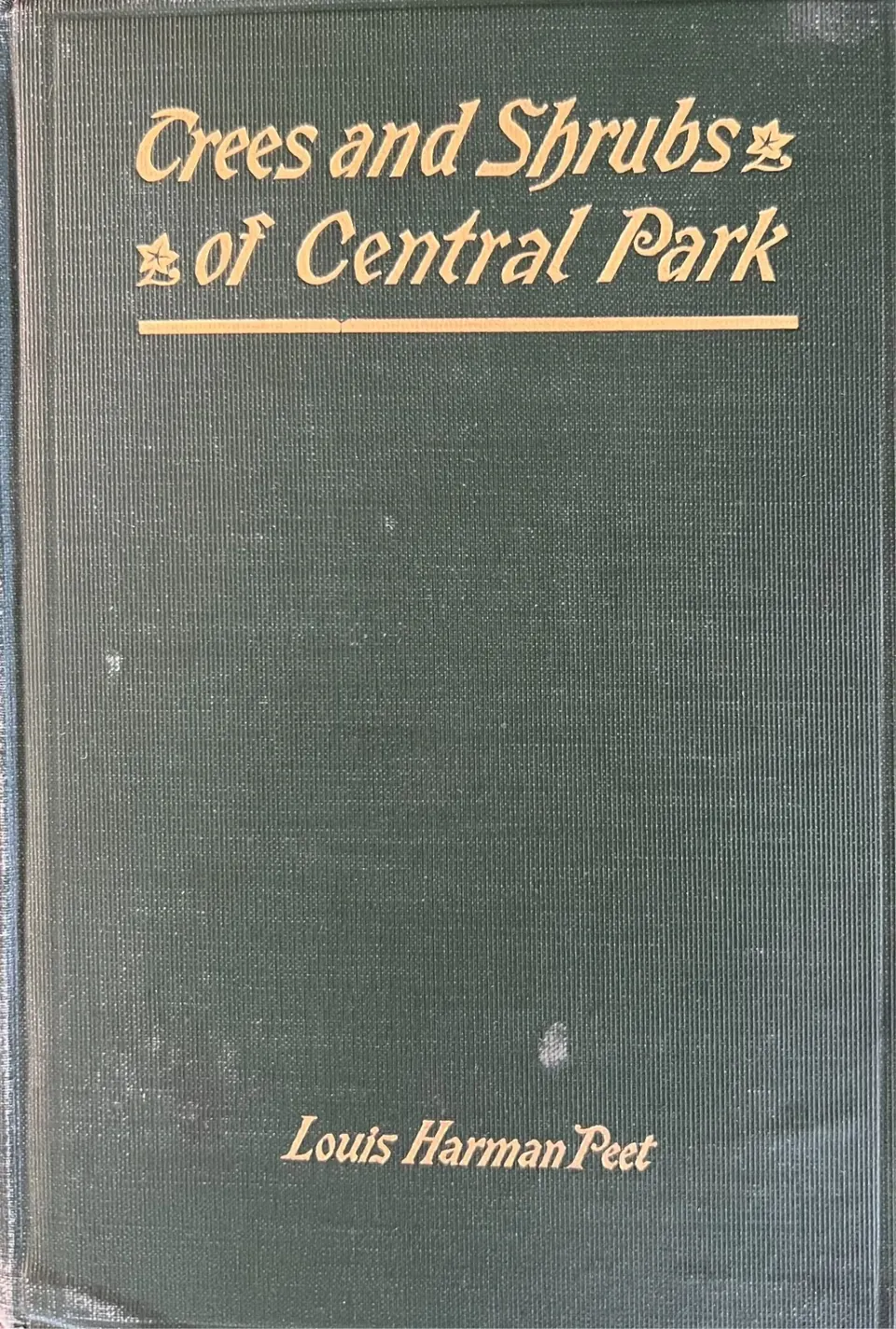 Green cloth cover of Trees and Shrubs of Central Park by Louis Harman Peet, 1903