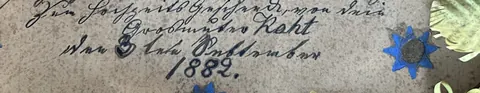 The closing lines of the wedding greeting reading as a wedding gift from Grandmother, with the date and the year 1882